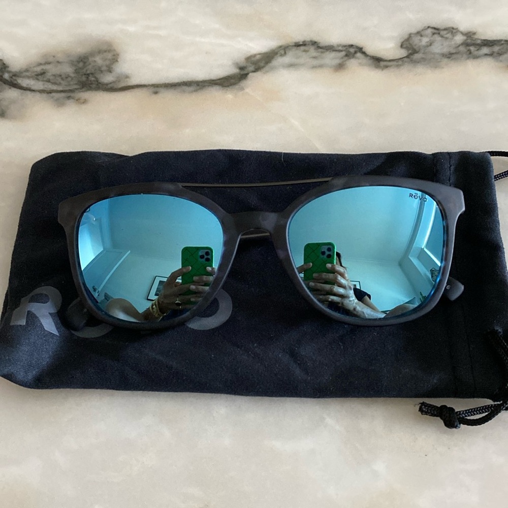 Revo blue mirrored sunglasses with pouch. Very good condition. Polarized lenses